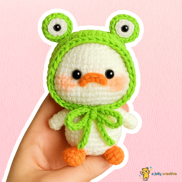 Duck with Frog Hats
